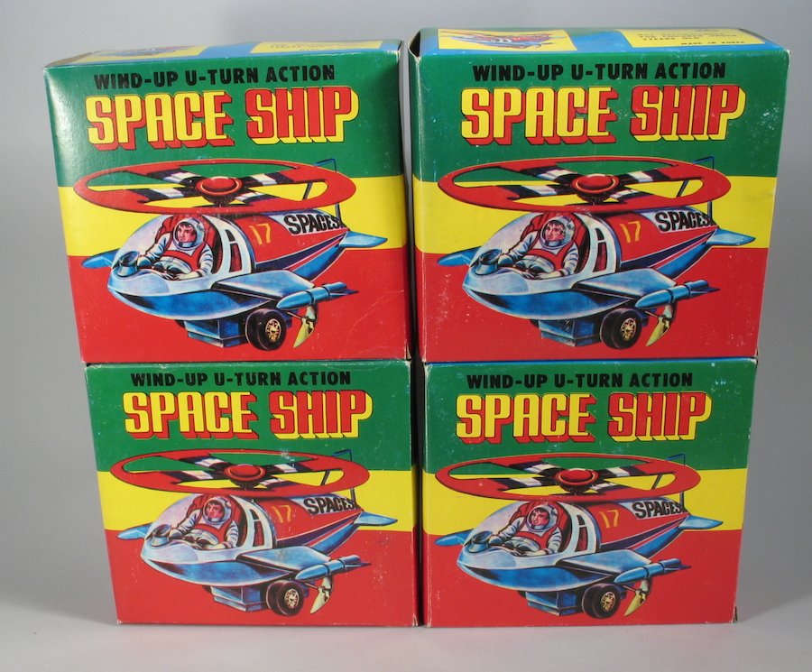 4 New Old Stock Space Ships In Box: 4 Working wind up new old stock space ships. Measure 5 inches wide.