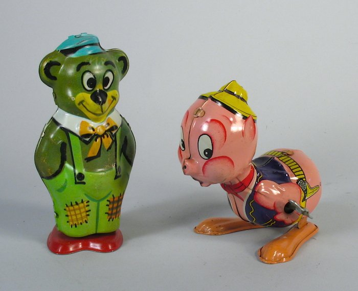 J. Chein Character Tin Toy Lot: Chein wind up tin toys. Porky type pig, country bear, and walking duck plus Wells hand standing clown. 4 pieces total, tallest is 5 inches.