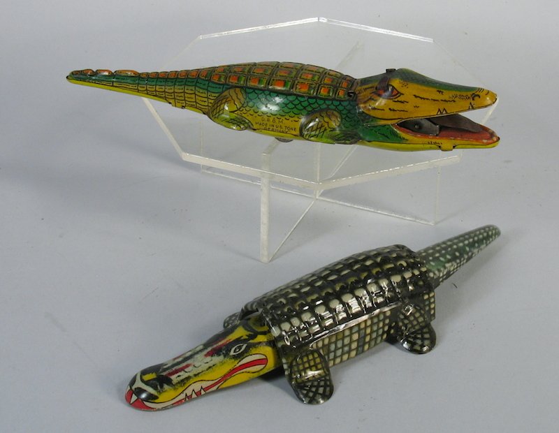 German Tin Alligators Gama: Two Tin alligator toys. Gama wind up and another German maker. Measure 6 1/2 inches long.