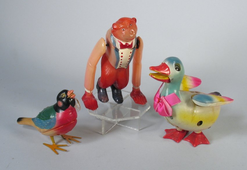 Japan Celluloid Roll Over Monkey in suit, duck and: Japan Celluloid Roll Over Monkey in suit, duck and bird. Very graphic group.