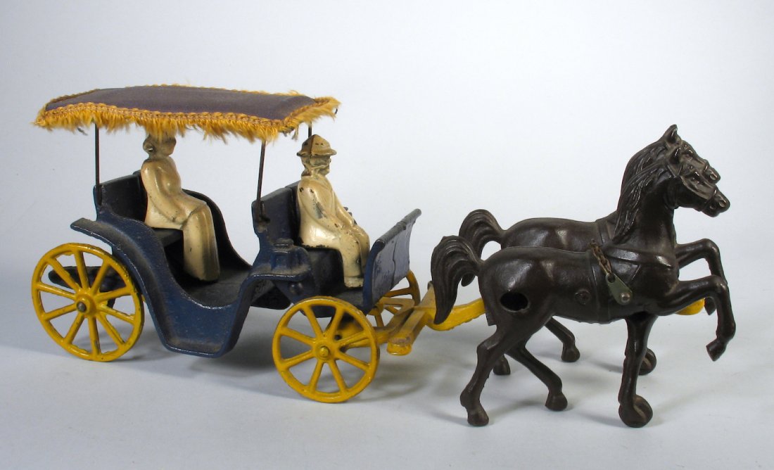 Cast Iron Surrey with 2 Horses & 2 Riders (1 of 2)
