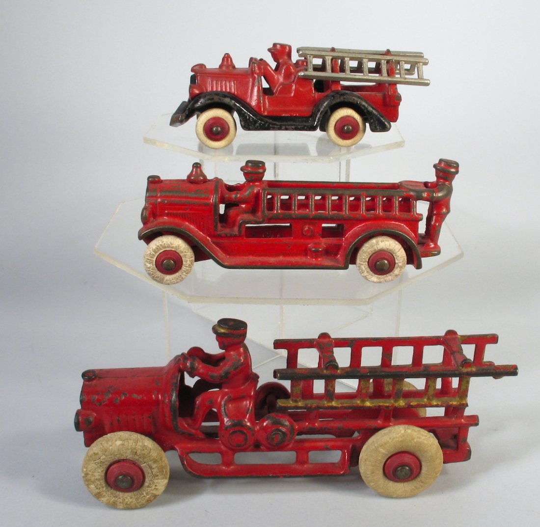 Three Cast Iron Fire Engines and Ladder Trucks (1 of 3)