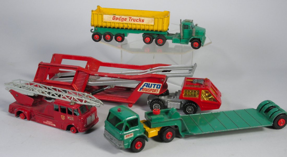 Matchbox General Lot Of Trucks: Matchbox General Lot Of Trucks, car carrier, fire engine, Dodge truck. Sold as shown.