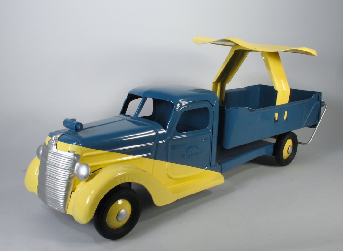 Buddy L Ride On Pressed Steel Truck: Buddy L Ride On Truck Immaculately restored colorful truck. 21 inches long.