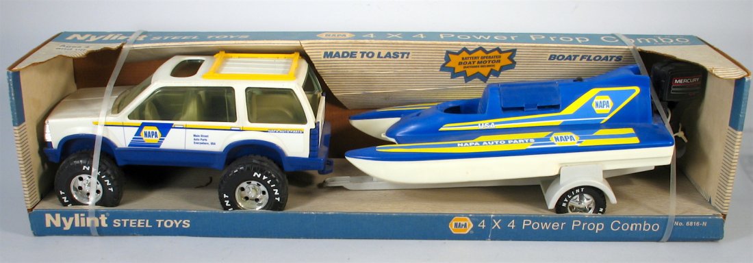 Nylint Pressed Steel Truck & Boat Mint in Box: Nylint Pressed Steel 4x4 Truck & Power Prop Boat (Plastic) Mint in Box. Never removed from the original box. Napa Advertising combo. Measures 26 inches long.