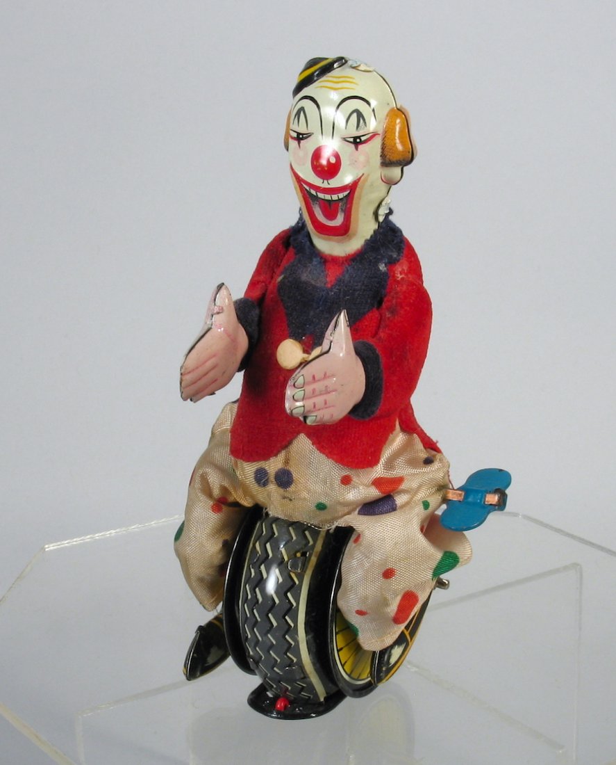 TPS Japan Tin Clown Balancing On Unicycle (1 of 2)