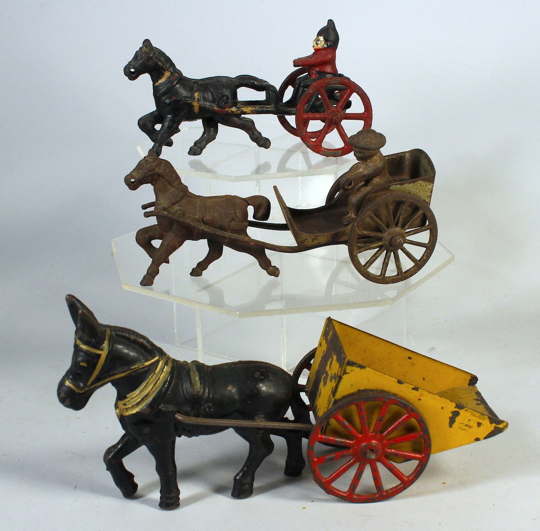Trio of Cast Iron Horse Drawn Wagons (1 of 2)