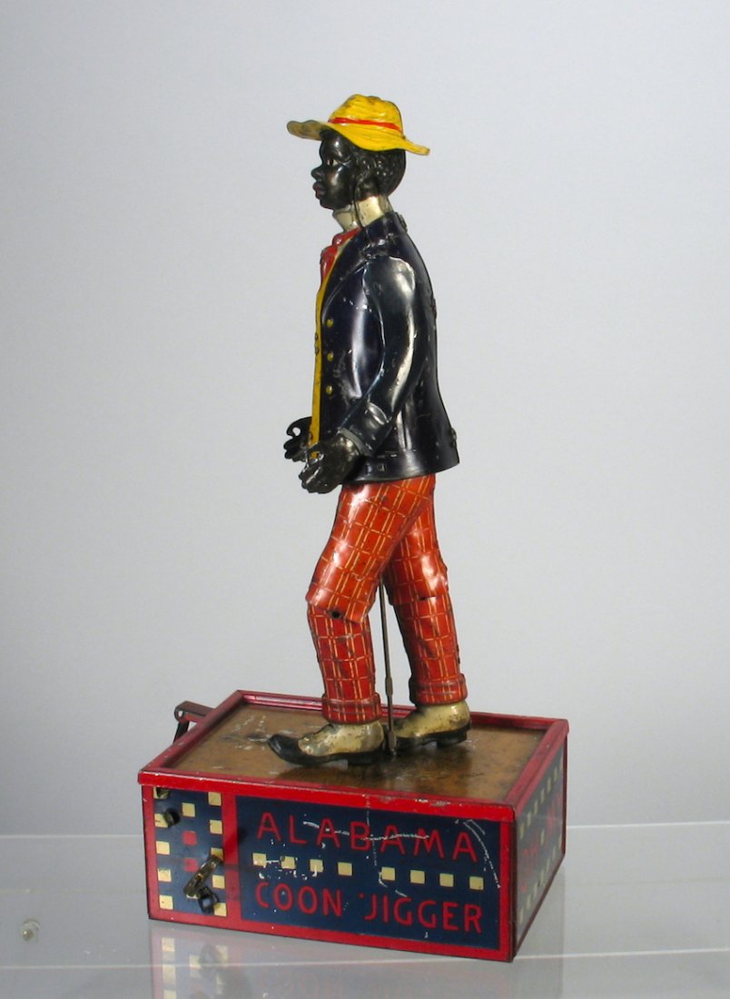 Lehmann German Alabama Coon Jigger: Lehmann German Alabama Coon Jigger. Tap Dancing tin wind up jigger toy by Lehmann. Excellent working tin toy.