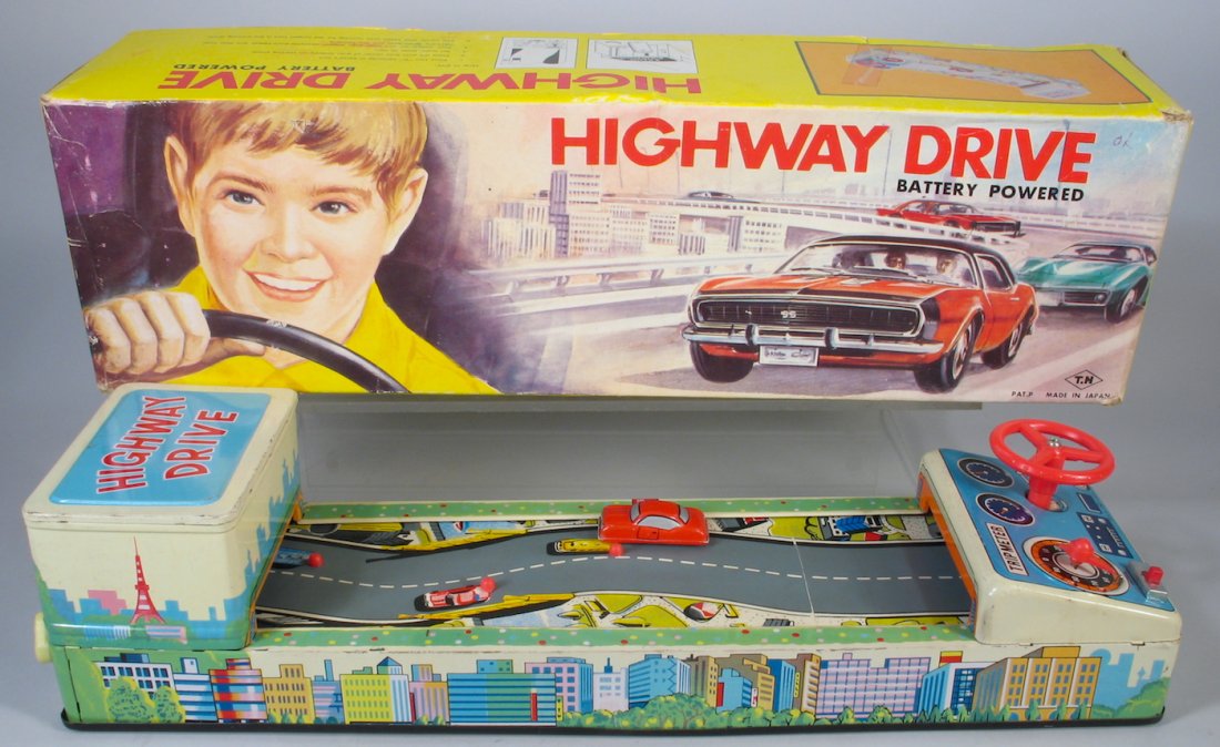 Nomura Japan Tin Highway Drive In Box: Nomura Japan Tin Highway Drive In Box. Car drive toy with controls and steering wheel. Excellent in the original box.