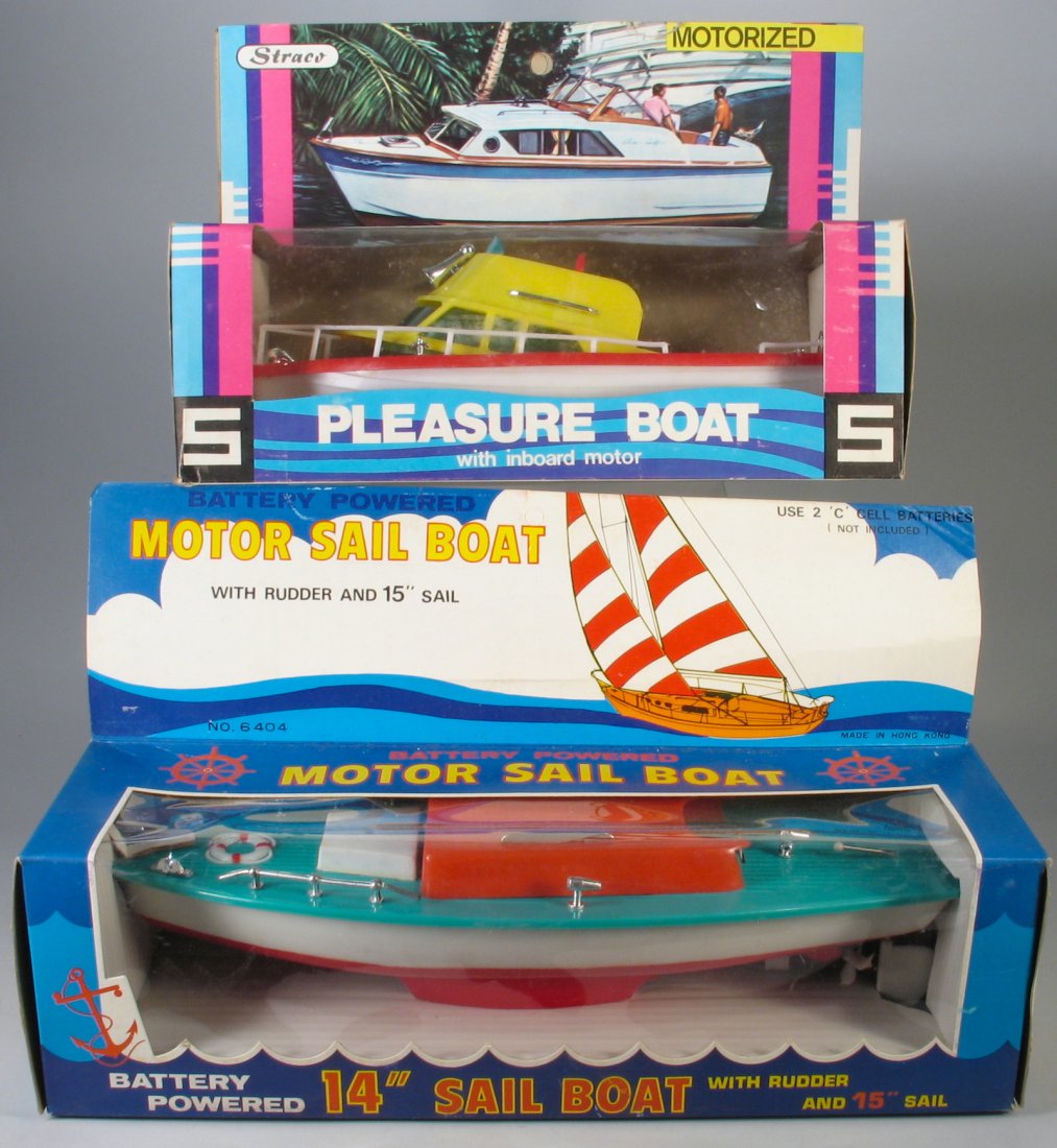 Mint Boxed Cabin Cruiser and Sail Boat with Motors: Mint Boxed Cabin Cruiser and Sail Boat. Pair of mint in box boats- Straco and battery powered Sailboat. New Old Stock. Largest 14 inches wide. Interestingly the Cabin Cruiser was Made for F J S of New