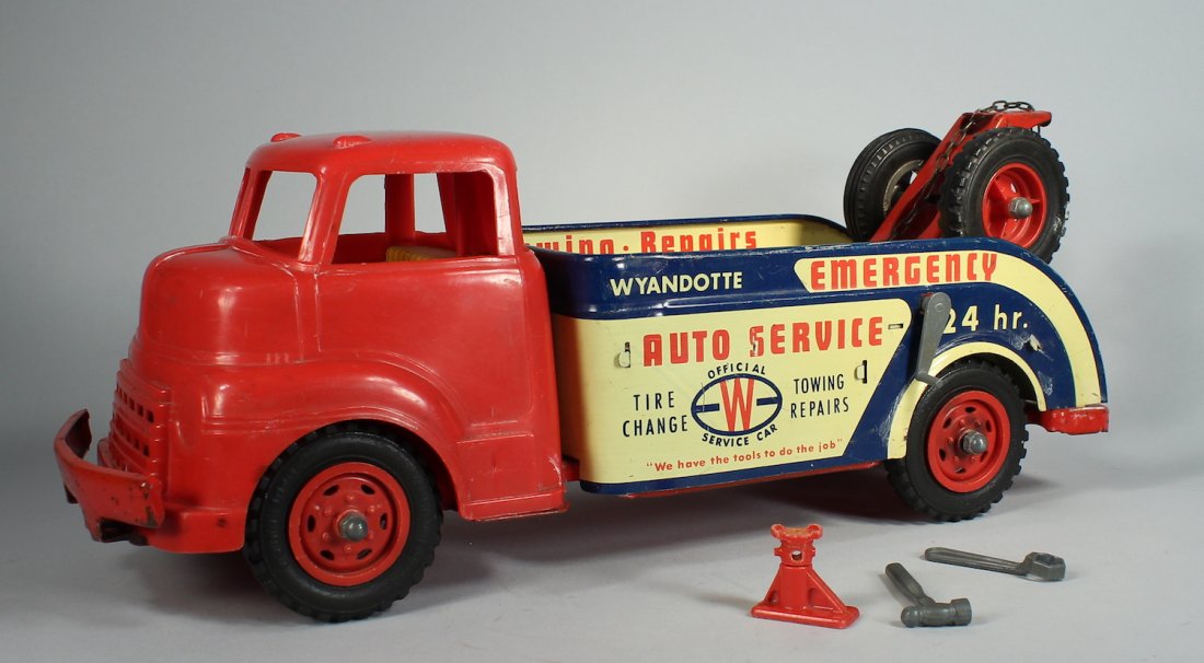 Wyandotte Auto Service Emergency Wrecker: Wyandotte Auto Service Emergency Wrecker. Graphic light pressed steel and plastic wrecker is 14 inches long. Excellent condition.