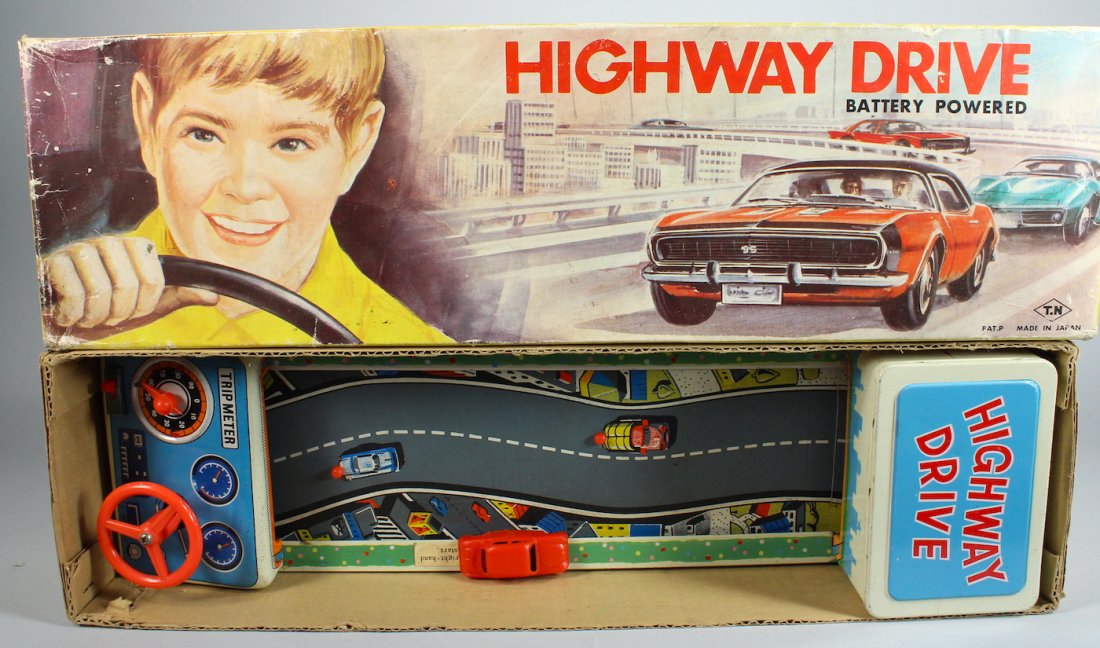 Nomura TN Japan Tin Highway Drive In Box: Nomura Japan Tin Highway Drive In Box. Car drive toy with controls and steering wheel. Excellent in the original box.