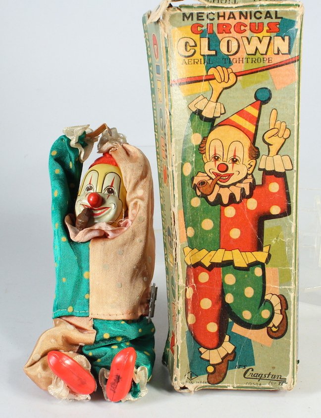 Cragstan Aerial Tightrope Clown In Box: Cragstan Aerial Tightrope Clown In Box. Japan tin wind up scarce clown toy. Measures 6 inches tall.