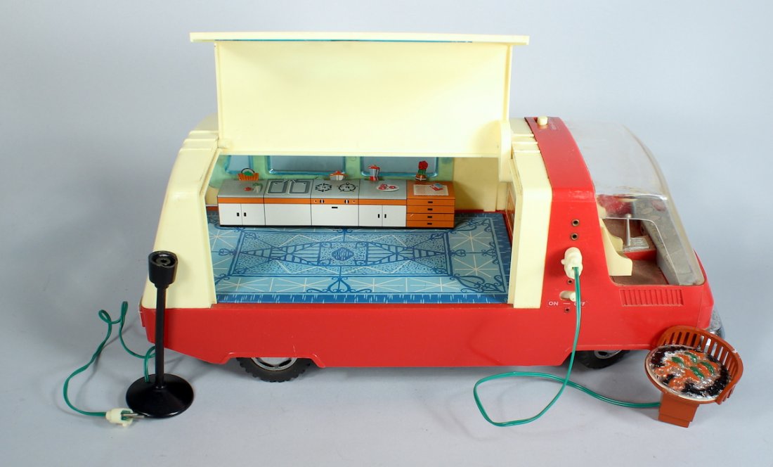 Japan Camping Car Futuristic Lift Up Roof and Interior: Battery operated tin and plastic futuristic camper car with a lamp and plug in cooking grill. Clever 1960s auto camper measures 12 inches long. Lamp missing a piece grill appears complete. Good, untes