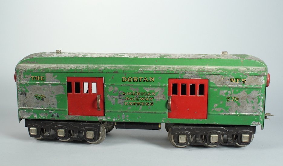 Dorfan American Railways Express Car 770: Dorfan American Railways Express Car 770. Baggage car by Dorfan. Paint loss as shown. Rare train is 13 1/2 inches long.
