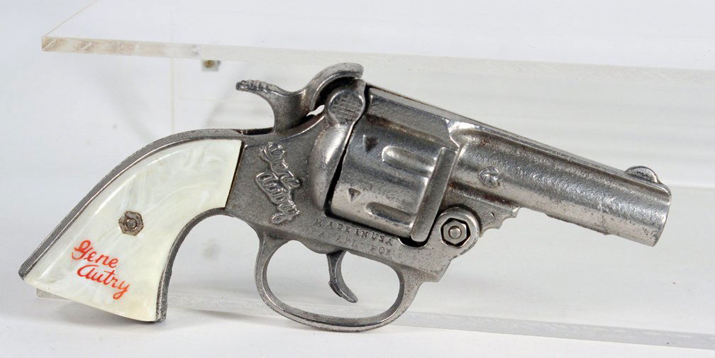 Gene Autry Cowboy Cap Gun Pistol: Gene Autry Cowboy Cap Gun Pistol. About 6-7 inches.