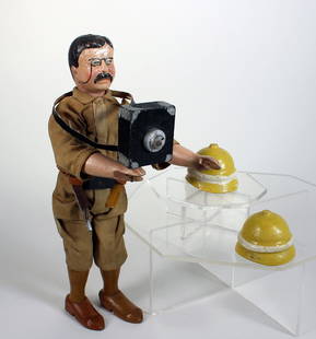 Schoenhut Teddy Roosevelt Safari Figure: Schoenhut Teddy Roosevelt Safari Figure. Very rare figure from the safari set. Wooden jointed figure, with safari outfit and original leather belt holding dagger and camera, 2 helmets included. 8 1/4