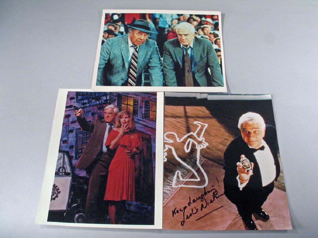 Leslie Nielson Autograph Lot: Leslie Nielson, three 8 x 10 glossy promos