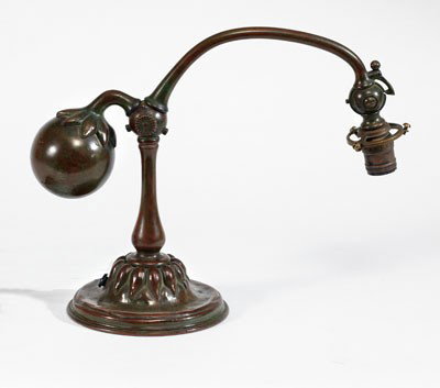 TIFFANY STUDIOS, NEW YORK: Bronze counter-balance lamp with eggplant weight, impressed signature and numbered 415 underfoot. 13 x 15 1/2 inches