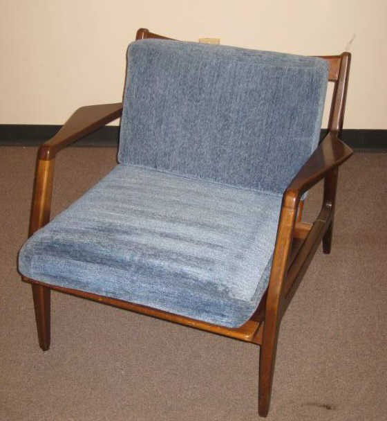 THREE PIECE DANISH SEATING GROUP: Settee and two armchairs, blue upholstered cushions, white and red metal label, imported by Selig. 26 x 74 inches (settee)