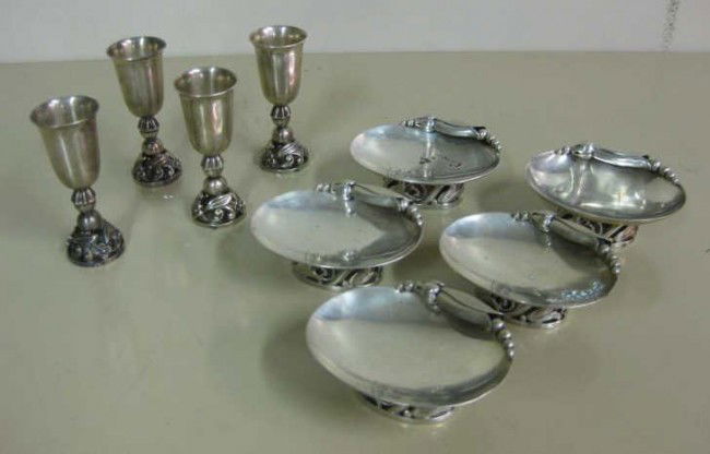 LA PAGLIA DESIGN FOR INTERNATIONAL STERLING: Collection of Danish modern design sterling silver table accessories comprising four liquors (100), 3 1/8 inches; and five oval footed small pedestal salts (117), 1 3/8 x 3 1/4 inches, all signed and