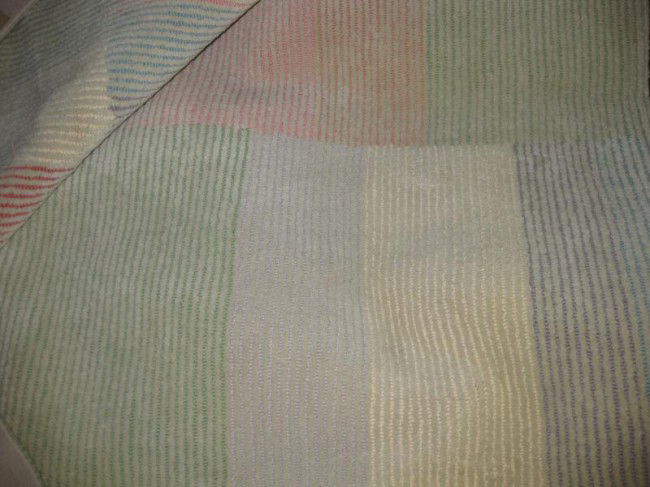 EDWARD FIELDS: Custom designed wool rug, 1982, pastel paneled bands, signed. 9 feet x 14 feet 4 inches.