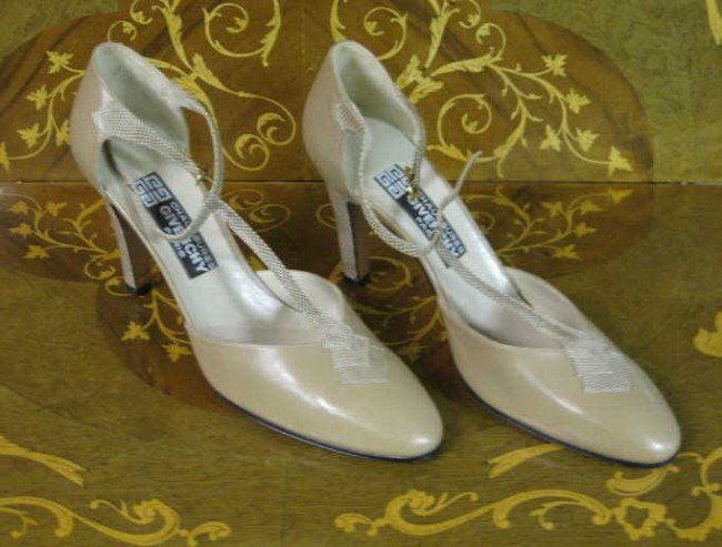 GIVENCHY, PARIS: Pair of leather and lizard skin heels, size 8 1/2.