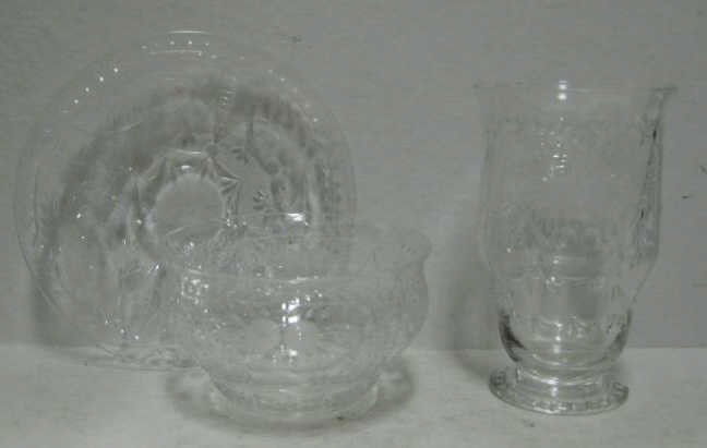 THOMAS WEBB, ENGLAND, CRYSTAL STEMWARE: Cut and acid etched decoration of flower and leaves, set for 12 comprising water goblets, finger bowls and underplates, total 36 pieces, acid etched mark, circa 1936-1949.