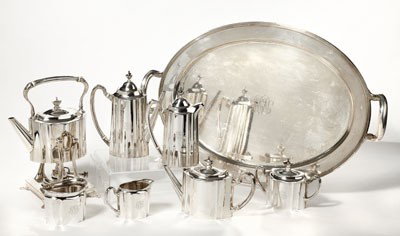 TIFFANY & CO., NEW YORK, NY: Exceptional sterling silver seven-piece coffee and tea service, Adam style with urn-form finials, comprising tea kettle on warming stand with lamp (13"), coffee pot (9 1/4"), teapot and chocolate pot,