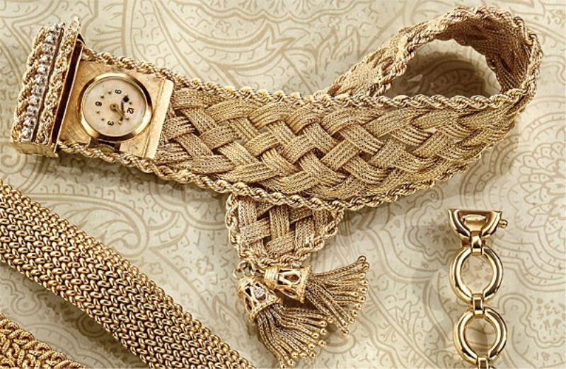 DIAMOND WATCH, LUCIEN PICCARD: 14k yellow gold vintage watch with a mesh bracelet with rope chain borders and a hinged clasp set with eleven single cut diamonds weighing .22ct.t.w. Bracelet has diamond set tassel trim. (Bracelet re