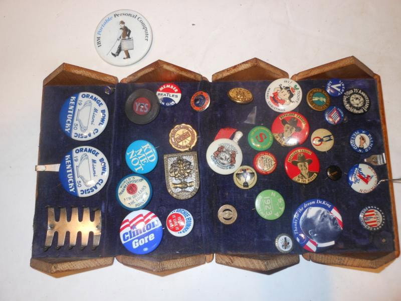 COLLECTION OF ASSORTED PIN BACK BUTTONS: Hop-a-long Cassidy, a 1930's German "Saarpfalz Remembrance Badge, Beatles, 1915 World's Panama Exposition, some political and others, held in a collapsible oak cased sewing box.