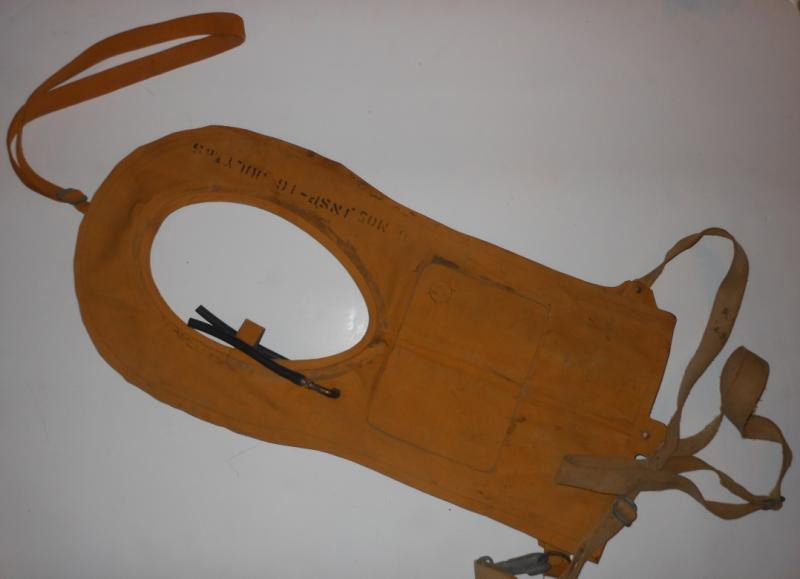 WWII AN6519 SURVIVAL VEST (MAE WEST): Inspection dates September 21, 1944 and July 1945, rubber hoses and Co2 inflators in tact.