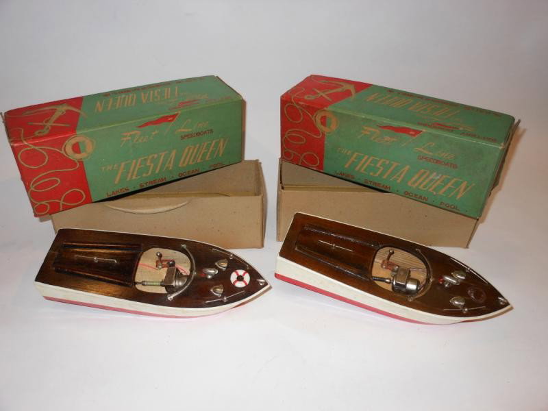 TWO FLEET LINE "FIESTA QUEEN" TOY WOODEN SPEEDBOA: Vintage early 1950s battery operated, both in a very good original box marked "The Fleet Line - Distributed by K&O Models, Inc.", boat length 9 1/2 in.