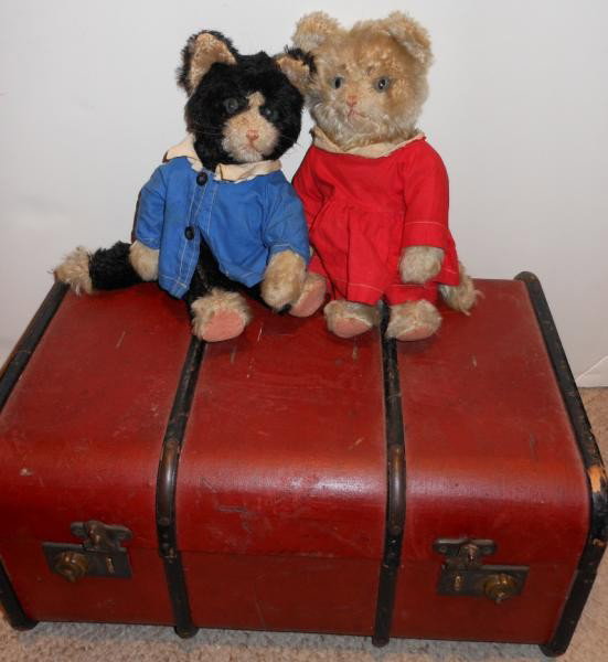 TWO KITTEN 'TEDDY BEARS': In the manner of Steiff, with jointed arms, legs and heads, along with assorted clothing accessories and red doll size steamer trunk.