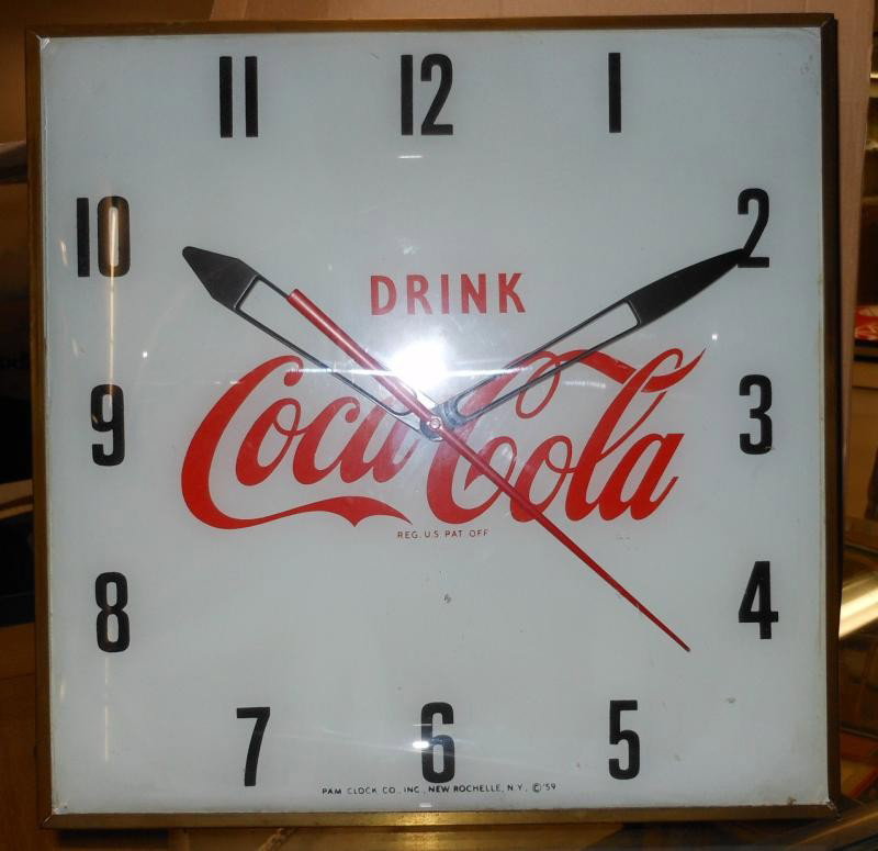 COCA-COLA 1950S PAM WALL CLOCK: Square with convex glass front, lighted, "Drink Coca-Cola", operational, 15 1/4 in. square.
