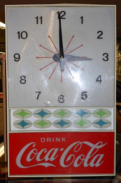 COCA-COLA 1960s NPI WALL CLOCK: Rectangular with blue and green four point star panel between clock & DRINK logo, operational, 20 x 12 1/2 in.