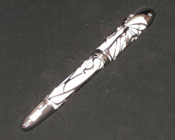 MONT BLANC, HOMAGE A ANDREW CARNEGIE: Limited edition white gold fountain pen, 455/888, with fitted wood presentation case; together with three bottles of ink.