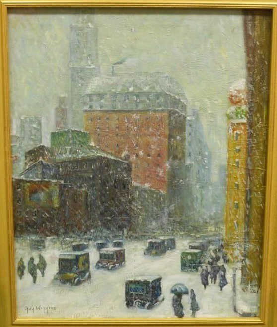 MANNER OF GUY CARLETON WIGGINS, AMERICAN: (1883-1962) Broadway, winter, oil on canvas, bears signature lower left, gilt-framed. 20 x 16 inches