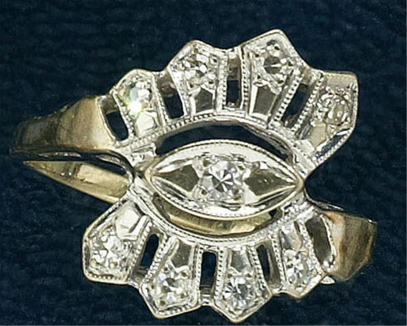 VINTAGE DIAMOND DINNER RING: 14k white gold ring set with nine single cut diamonds weighing .20ct.t.w. Size 9 1/2. 3.6 grams.
