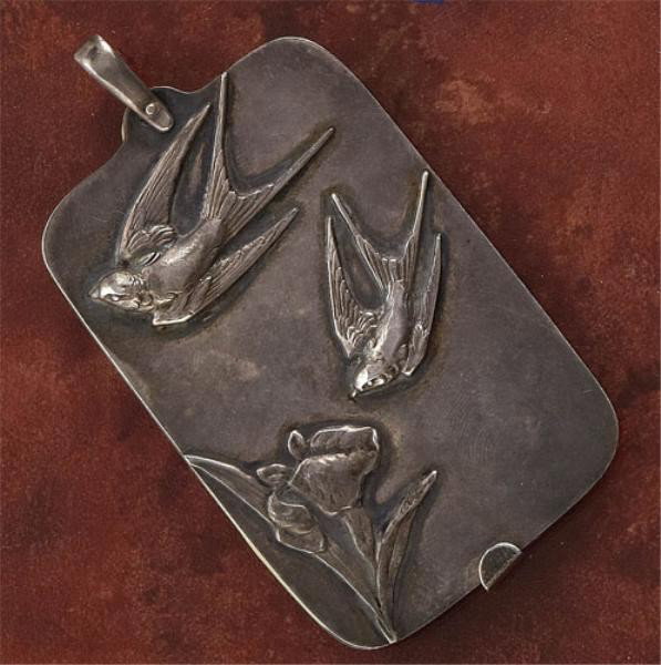 VICTORIAN STERLING SILVER CHATELAINE NOTEBOOK: Possibly by Howard Sterling Co., Providence, RI; front cover decorated in Aesthetic style with applied flying birds and flower, containing six celluloid day-cards (Missing Wednesday) with some old not