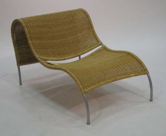 ARORG: STEPPE LOUNGE, natural rattan and metal frame, outdoor use. 26 1/2 x 29 1/2 inches Retail Price: $ 890.00