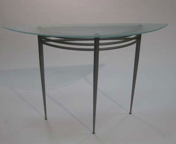PASCAL MOURGUE: ATLANTIQUE console table, by Artelano, grey silvered frame with three legs supporting a demi-lune glass top. 32 3/4 x 52 1/2 x 13 3/4 inches Retail price: $ 980.00