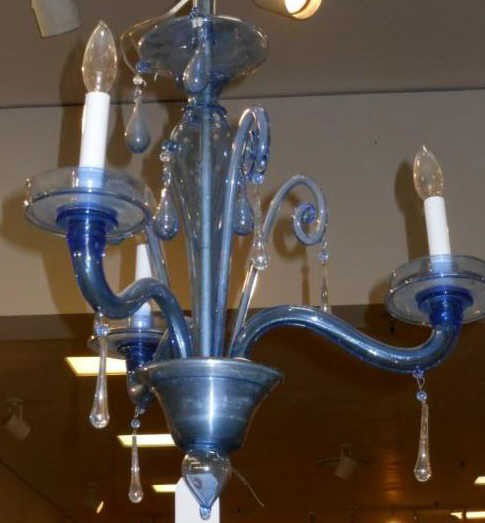 Blue art glass three light hanging fixture.