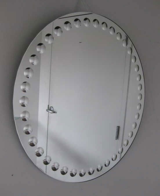 ARTELUCE WALL MIRROR: circular with band of convex mirrors along edge, circa 1997. diameter 23 1/2 inches