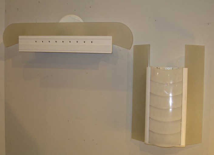 TWO WHITE ENAMEL METAL WALL LAMPS.: one HORIZON by Flos.