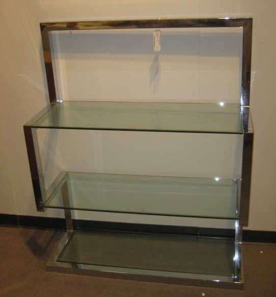 TUBULAR CHROME ETEGERE: with three glass shelves, possibly designed by Milo Baughman, circa 1970's. 54 x 44 x 16 inches