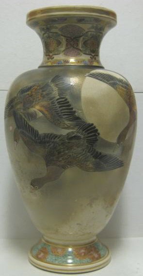 JAPANESE POTTERY VASE: Flying bird decoration, pierced bottom, Nippon mark and signed, circa 1900. Height 19 in.