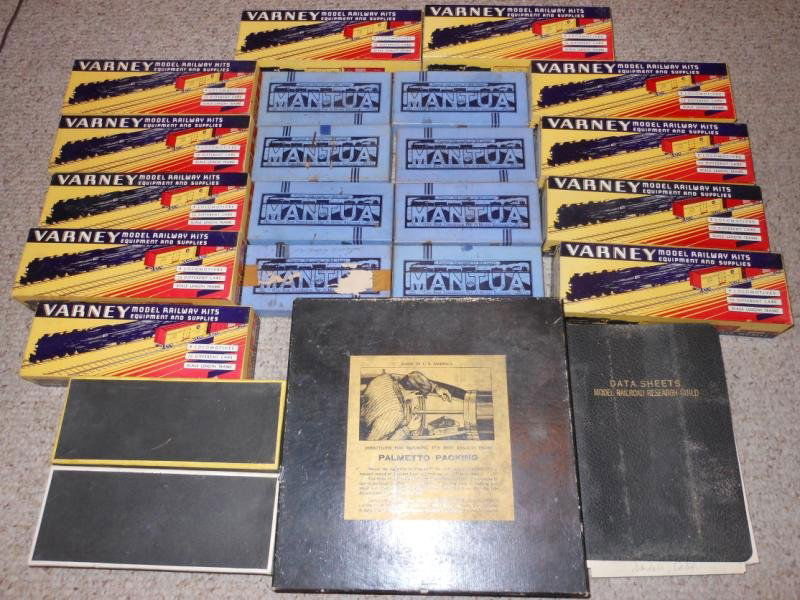 COLLECTION OF VINTAGE TOY TRAIN ITEMS: Including several Varney rail car kits, several Mantua rail car kits, and more, most opened and possibly incomplete.