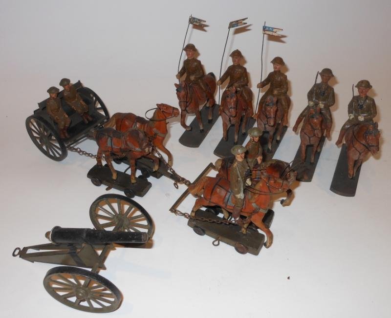 LINEOL AND MORE GERMAN COMPOSITION TOY SOLDIERS: German composition mounted soldiers with metal wagon and metal cannon; metal wagon with two drivers, being pulled by four horses on wheeled platforms, the 4 platforms marked below "LINEOL", two with r