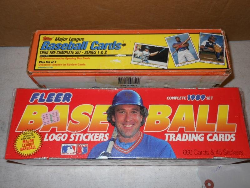 TWO COMPLETE BASEBALL CARD SETS: 1995 Topps & 1989 Fleer, they include Ken Griffey Jr., Randy Johnson & John Smoltz rookie cards.